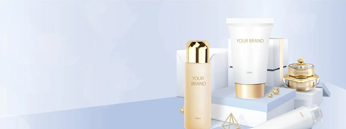 Collection of luxury skincare products on a stylish platform with packaging labeled 'YOUR BRAND', featuring gold accents.
